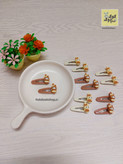 گیره تق تقی روکش دار عروسکی